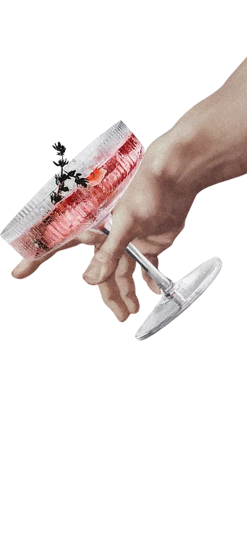 Hand entering from the right of the screen holding a cocktail